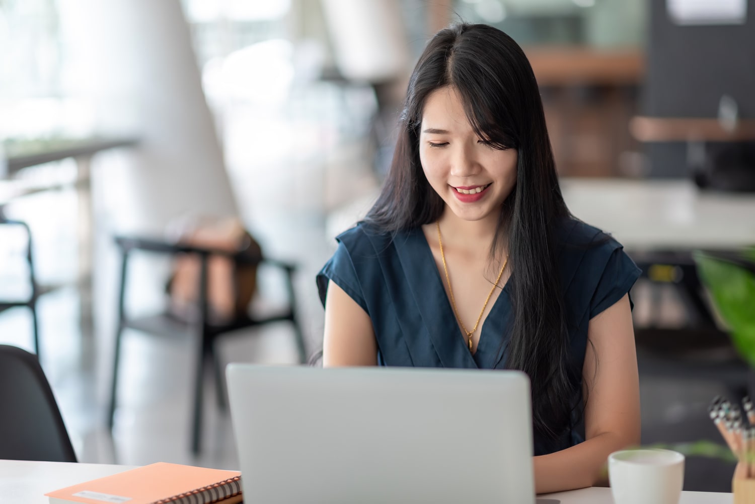 a woman with a laptop